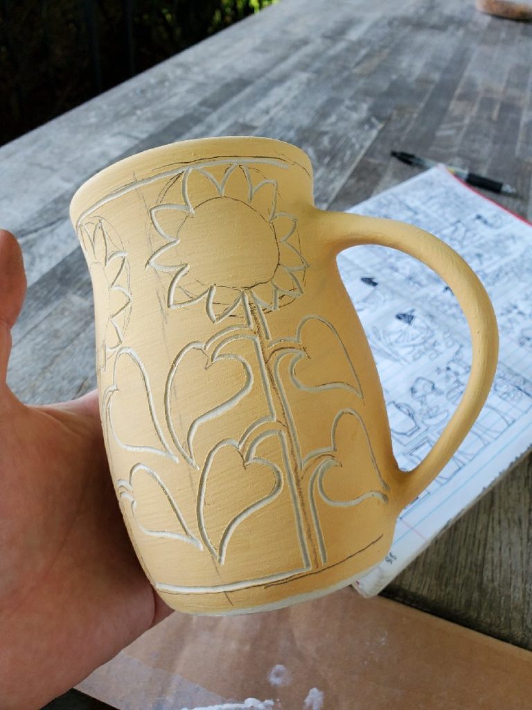 mug with sgraffito lines carved