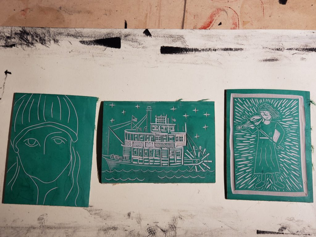 carved linoleum blocks ready to be inked