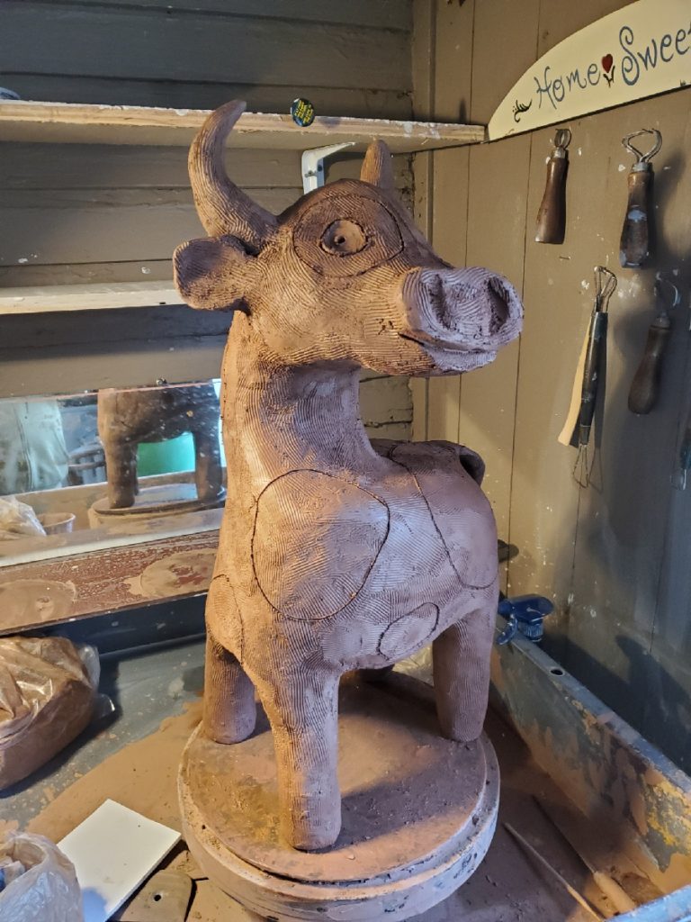 clay bull sculpture