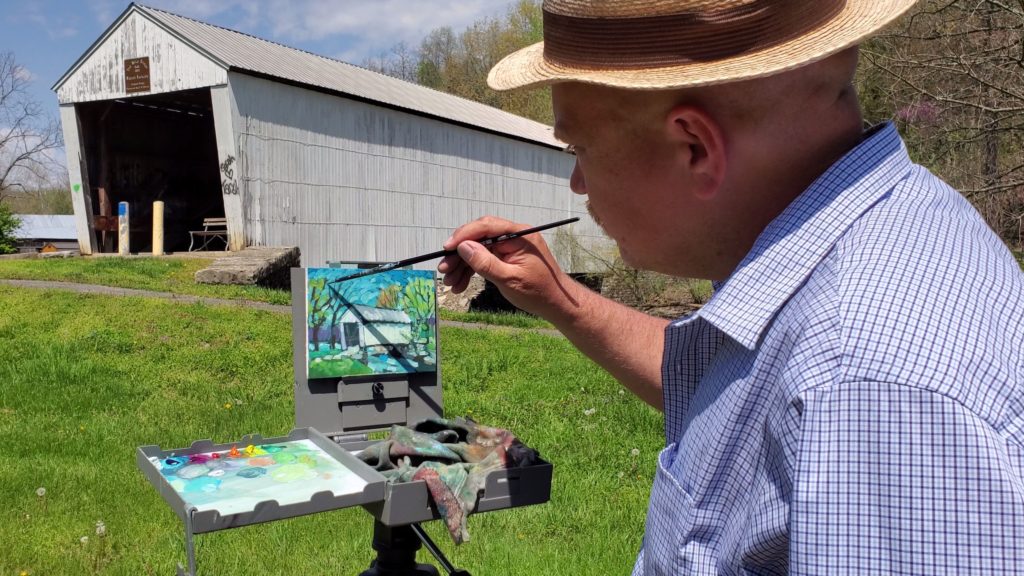 artist ken swinson painting the walcott covered bridge in bracken county kentucky