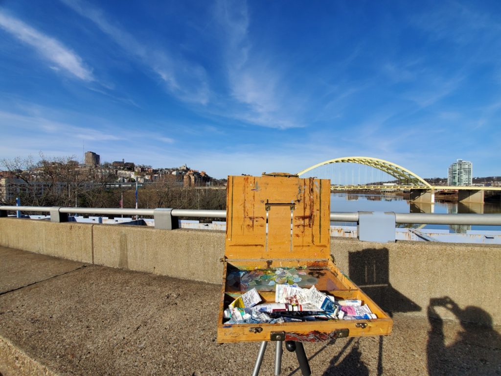 plein air easel setup in front of mt adams in cincinnati ohio