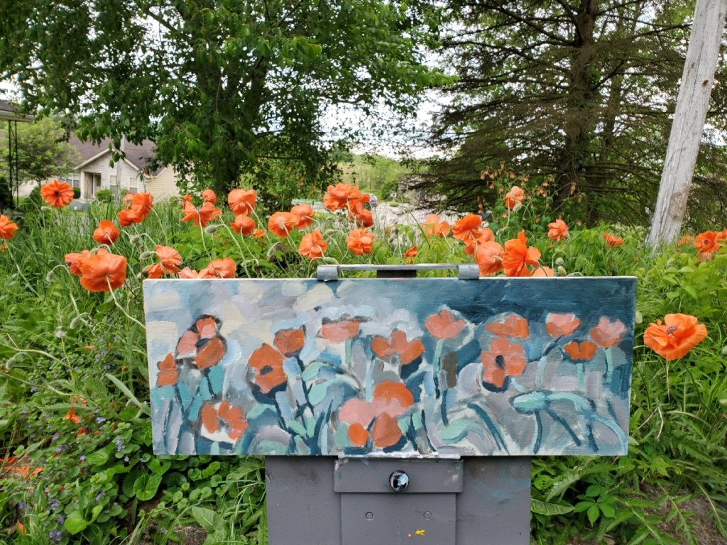 work in progress photo of plein air painting of poppies by artist ken swinson