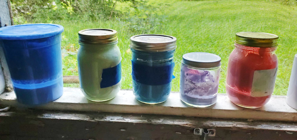 mason jars with colorful ceramic glaze
