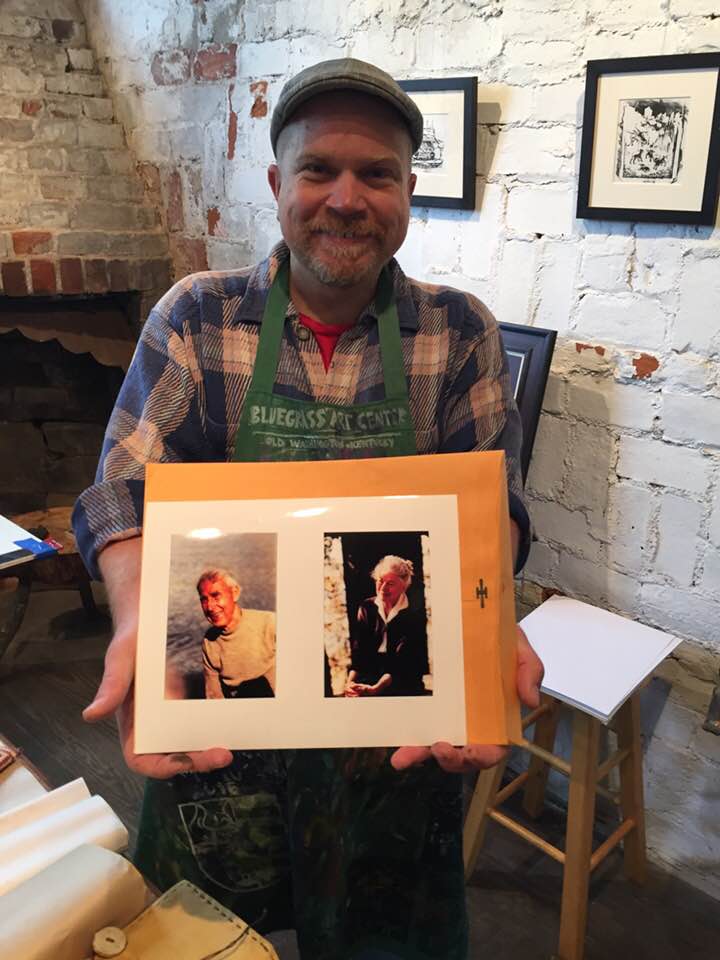 ken swinson with photos of harlan and anna hubbard