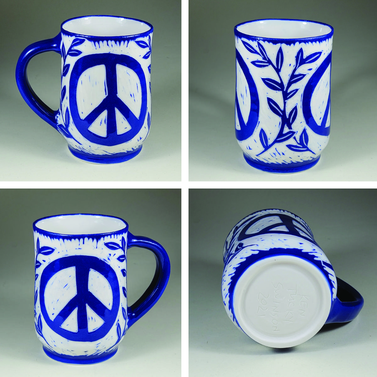 porcelain cup with blue sgraffito design peace symbol