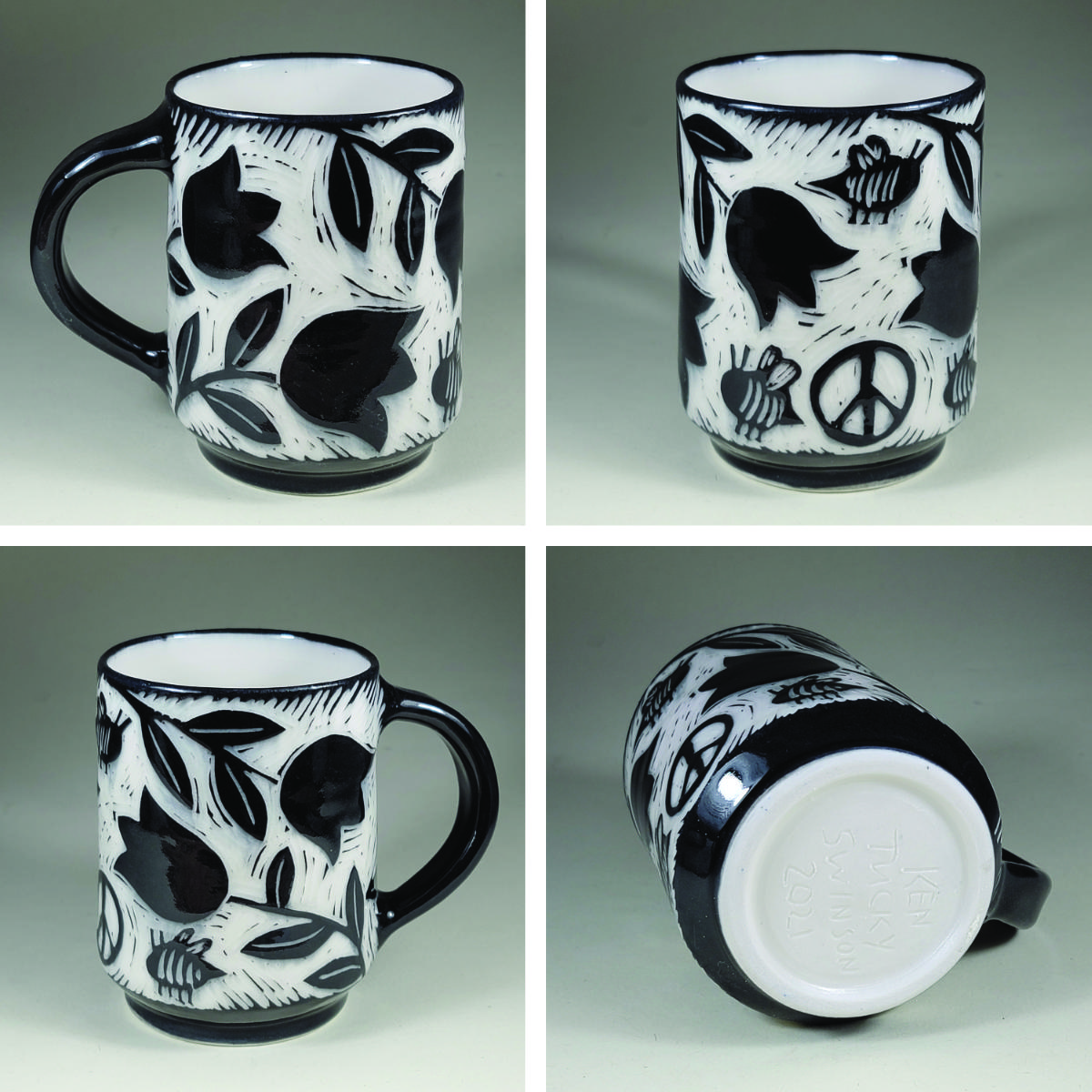 porcelain cup with tulip bees and peace symbol black sgraffito design