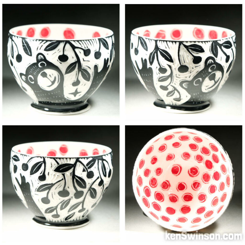 four views of a porcelain bowl. There is a bear picking cherries on the exterior. Red cherries on the interor.