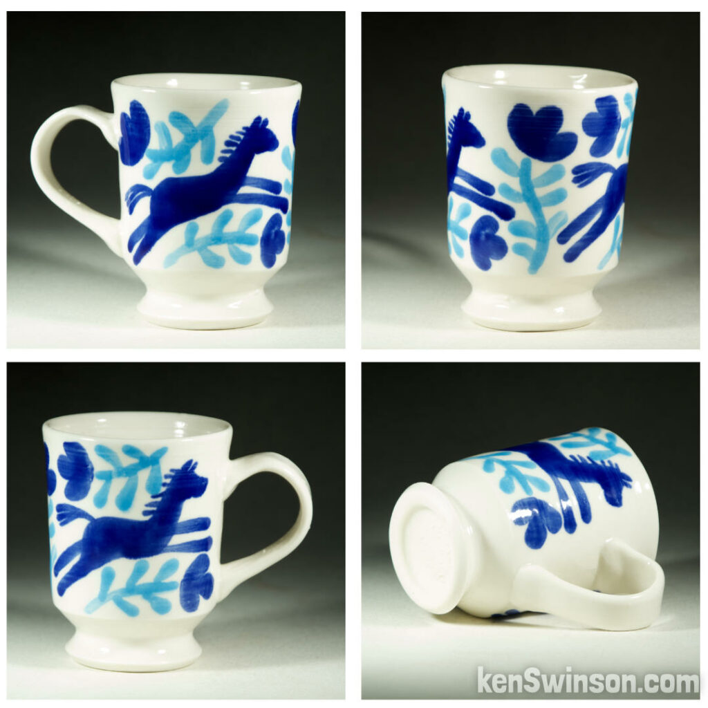 handmade wheel thrown porcelain cup with multi-colored horse and flowers blue pattern made in kentucky by Ken Swinson