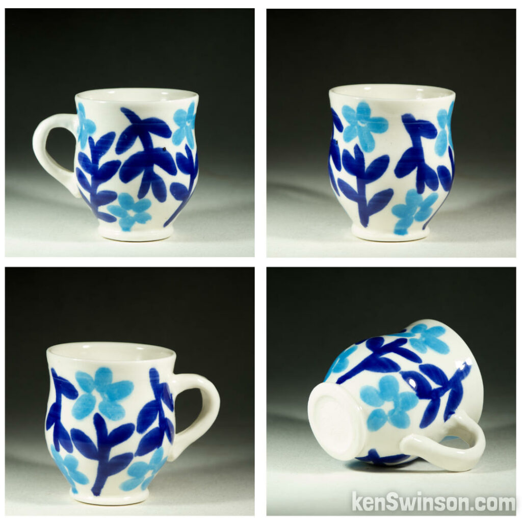 handmade wheel thrown porcelain teacup with turquoise and cobalt flower pattern